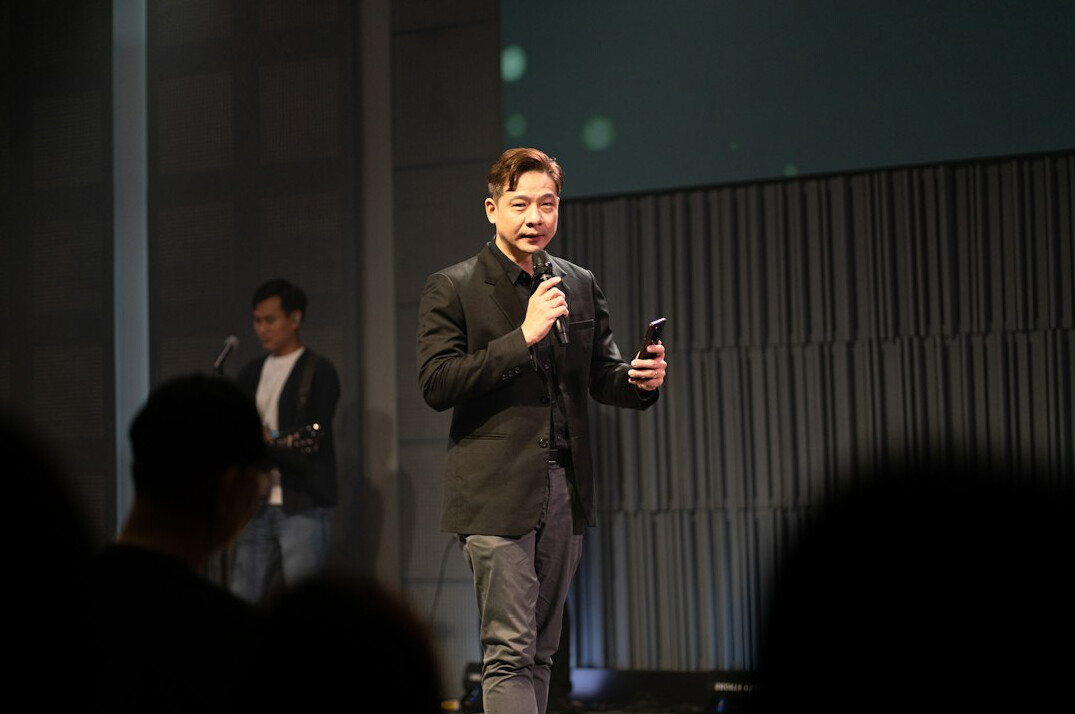 business professional speaking at conference